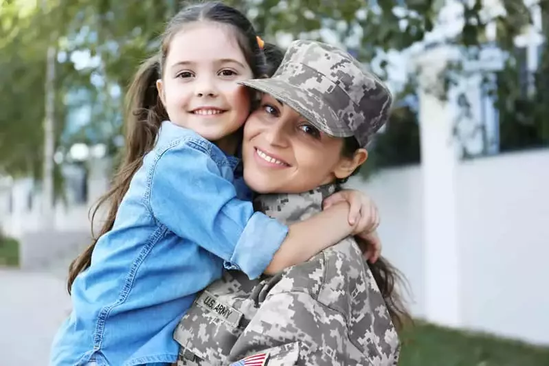 military woman with daughter
